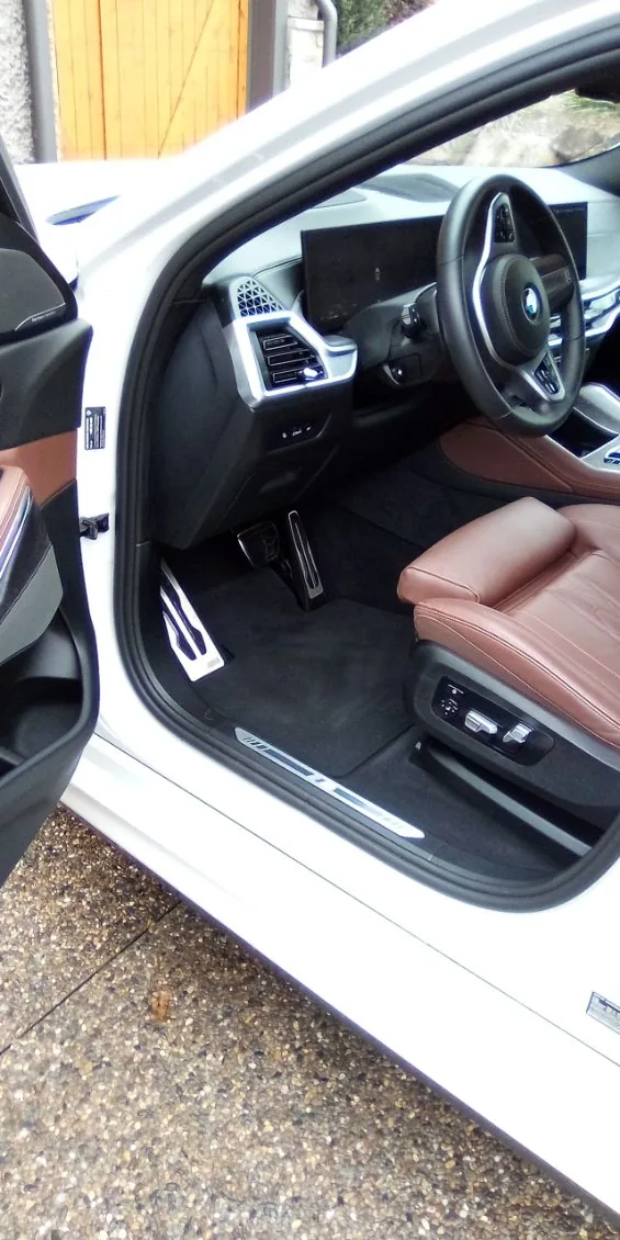 BMW interior with cognac leather cleaned and conditioned by Grindtime